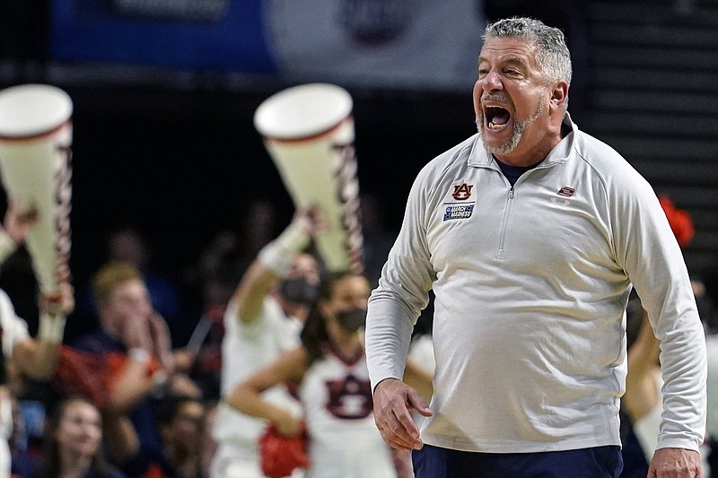 Auburn Coach Bruce Pearl reacts during the second round of a NCAA Tournament game against Miami in Greenville, S.C., in March. The Tigers are just one of many basketball programs taking advantage of the NCAA transfer portal and adjusting to the sport’s shifting landscape.
(AP/Brynn Anderson)