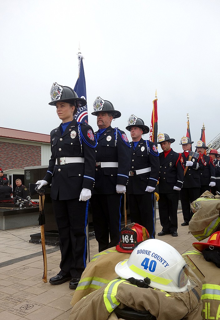 Fire service members line up during a memorial for fallen firefighters Sunday at the Fire Fighters Memorial in Kingdom City. (Michael Shine/FULTON SUN)