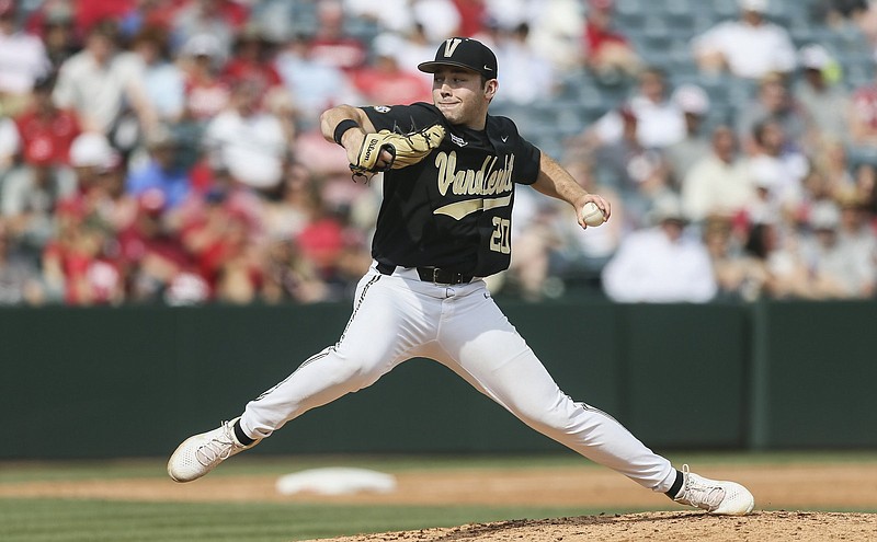 Vanderbilt Carter Holton (20) pitches, Sunday, May 15, 2022 during the third inning of the series closer at Baum-Walker Stadium in Fayetteville. Check out nwaonline.com/220516Daily/ and nwadg.com/photos for a photo gallery...(NWA Democrat-Gazette/Charlie Kaijo)