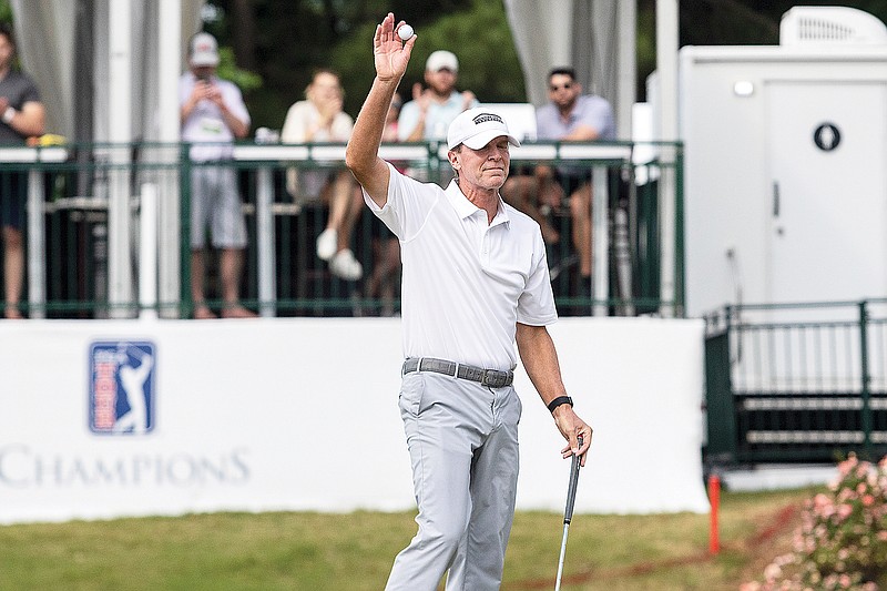 Steve Stricker waves to the fans Sunday after finishing on the 18th hole after the final round at the Regions Tradition in Birmingham, Ala. (Associated Press)