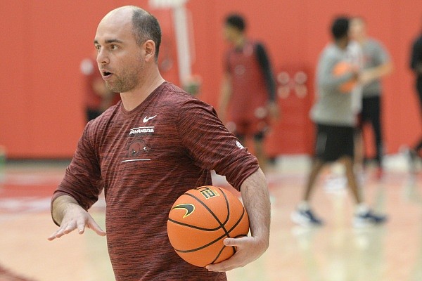 Anthony Ruta leads a drill Tuesday, Sept. 28, 2021, during practice in the university practice facility in Fayetteville. Visit nwaonline.com/210929Daily/ for the photo gallery.