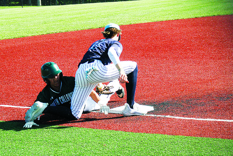 Matthew Weber of North Callaway slides into third base during Monday’s 11-1 loss to Father Tolton in the Class 3 District Tournament semifinals in Mokane. (Jeremy Jacob/Fulton Sun)