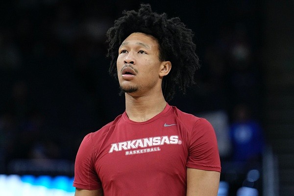 Arkansas forward Jaylin Williams warms up before a college basketball game against Duke in the Elite 8 round of the NCAA men's tournament in San Francisco, Saturday, March 26, 2022. (AP Photo/Tony Avelar)