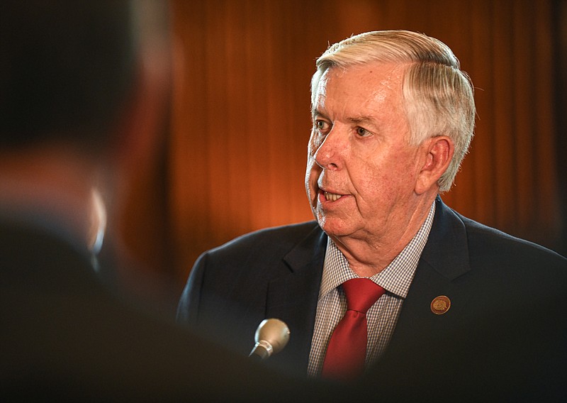 Missouri Gov. Mike Parson answers questions during a press conference Wednesday, May 18, 2022, following a brief ceremony in which he signed the redistricting bill that was passed during the legislative session that ended May 13. (Julie Smith/News Tribune photo)