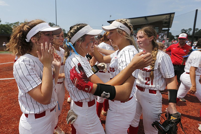 Tuckerman players celebrate after the Lady Bulldogs’ 6-2 victory over East Poinsett County in the Class 2A softball state championship Thursday at Benton Athletic Complex. More photos at arkansasonline.com/520soft2a/
(Arkansas Democrat-Gazette/Thomas Metthe)