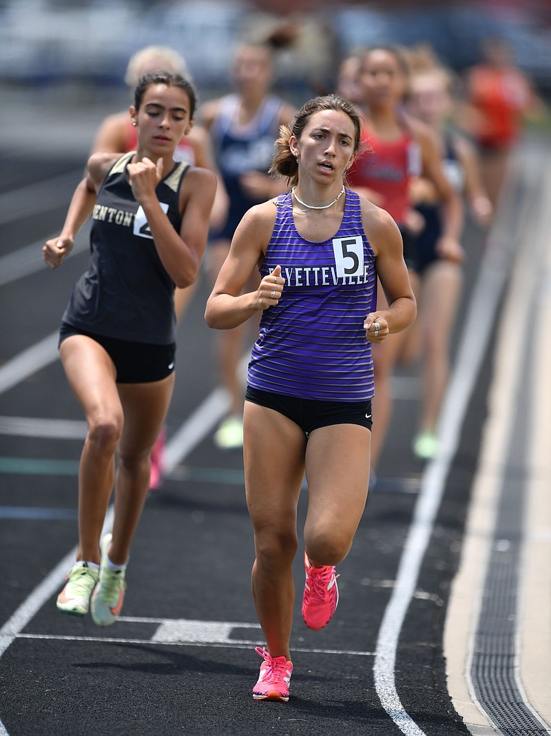 Fayetteville’s Kessiah Bemis  (right) competes in the 800 meters during the state high school heptathlon Thursday at Fayetteville. Bemis won the heptathlon with 4,477 points.
(NWA Democrat-Gazette/Andy Shupe)