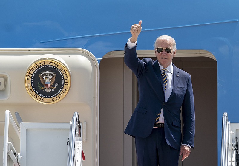 President Joe Biden gestures as he boards Air Force One for a trip to South Korea and Japan, Thursday at Andrews Air Force Base, Md. Video at arkansasonline.com/520bidenasia/.
(AP/Gemunu Amarasinghe)