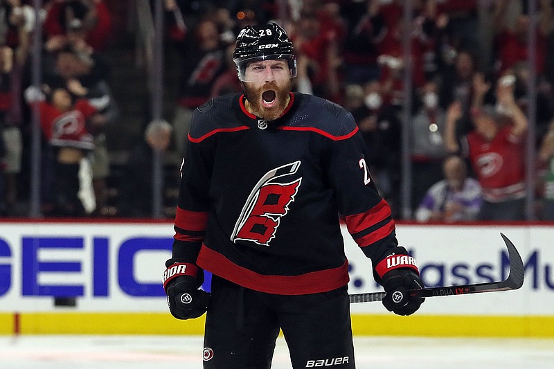 Carolina’s Ian Cole celebrates his goal in overtime that gave the Hurricanes a 2-1 victory over the New York Rangers in Game 1 of their NHL Eastern Conference semifinal series Wednesday night in Raleigh, N.C.
(AP/Karl B. DeBlaker)