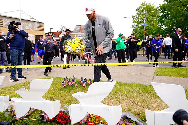 Buffalo Bills' Josh Allen visits the scene of Saturday's shooting at a supermarket, in Buffalo, N.Y., Wednesday, May 18, 2022. (AP/Matt Rourke)