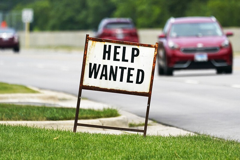 A help wanted sign is displayed at a gas station in this July 27, 2021 file photo. (AP/Nam Y. Huh)