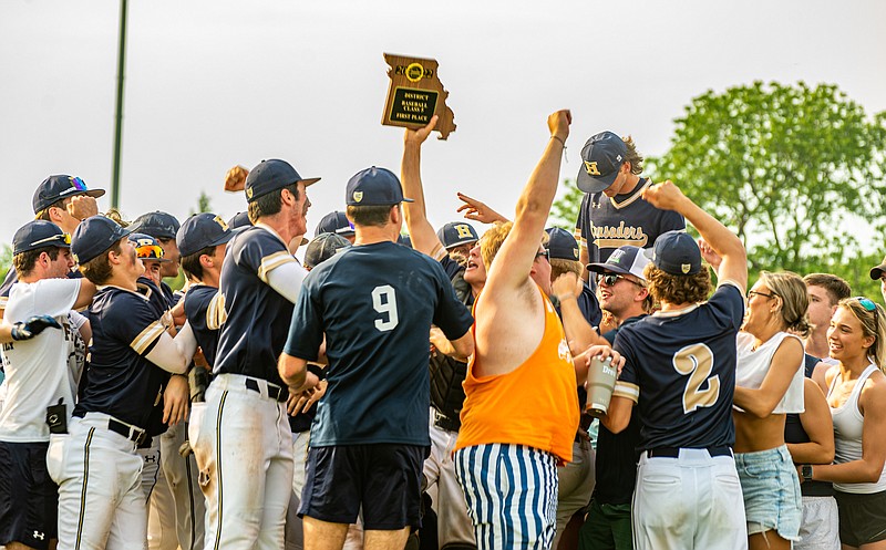 Helias players and students celebrate after Friday night's win against Washington in the Class 5 District 5 Tournament at the American Legion Post 5 Sports Complex. (Ken Barnes/News Tribune)