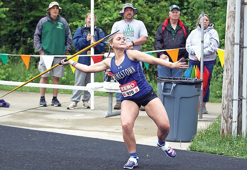 Jamestown’s Jolene Sorrells reaches back to throw the javelin during the Class 1 track and field state championships Saturday at Adkins Stadium. (Greg Jackson/News Tribune)