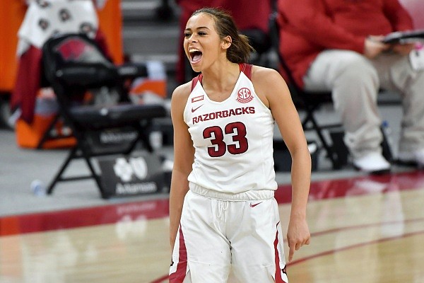 Arkansas guard Chelsea Dungee celebrates after hitting a shot against Connecticut during the second half of a game Thursday, Jan. 28, 2021, in Fayetteville. (AP Photo/Michael Woods)
