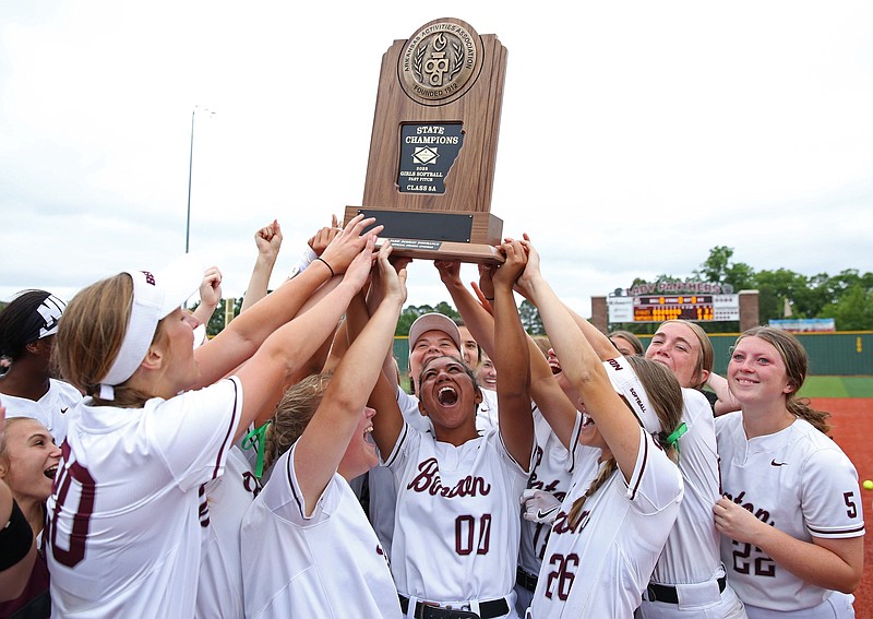 The Benton Panthers celebrate winning the 5A Arkansas State Softball Championship game against Greene County Tech in Benton on Sunday, May 22, 2022. (Arkansas Democrat-Gazette/Colin Murphey)