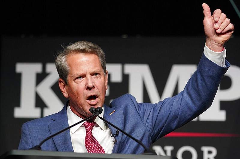 Republican Gov. Brian Kemp waves to supporters during an election night watch party, Tuesday, May 24, 2022, in Atlanta. Kemp easily turned back a GOP primary challenge Tuesday from former U.S. Sen. David Perdue, who was backed by former President Donald Trump. (AP/John Bazemore)