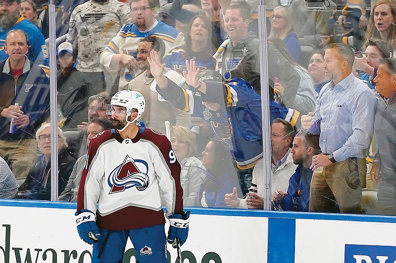 Fans react after a goal by Nazem Kadri of the Avalanche during the second period in Monday night’s Game 4 of a Western Conference second-round playoff series against the Blues in St. Louis. (Associated Press)