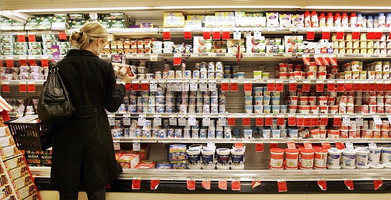 A customer shops in the dairy section of a Chicago supermarket in this file photo. Some countries are starting to restrict food exports to cope with high prices made worse by Russia’s invasion of Ukraine.
(AP)