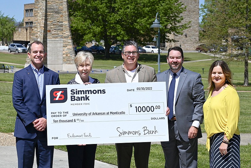 Brian Hargis of Simmons Bank (left), UAM Chancellor Peggy Doss, Tommy Jarrett of Simmons Bank, Jeff Weaver of UAM and Roxanne Smith of UAM were on hand for the presentation. 
(Special to The Commercial/University of Arkansas at Monticello)