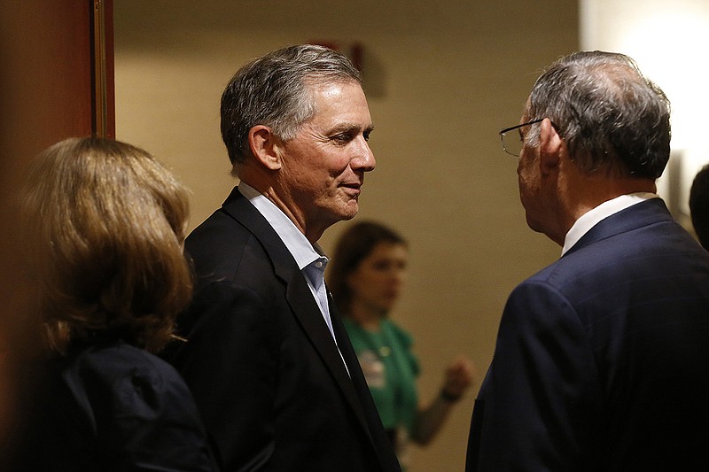 U.S. Rep. French Hill (left) talks with U.S. Sen. John Boozman (right) after Hill won the Republican nomination for the second Congressional district on Tuesday, May 24, 2022, at the Embassy Suites Little Rock. .(Arkansas Democrat-Gazette/Thomas Metthe)
