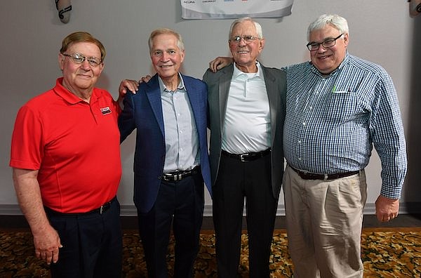 The 2022 Class of the Arkansas Sportscasters and Sports Writers Hall of Fame (from left) Mike Irwin, Chris Mortensen, Mike Nail and Bob Holt pose Wednesday, May 25, 2022, after a ceremony at the Hawgs Illustrated Sports Club luncheon at Mermaids in Fayetteville.
