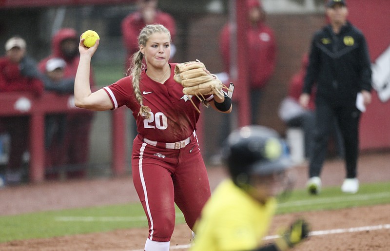 Arkansas Hannah Gammill (20) forces an out at first, Saturday, May 21, 2022, during the fifth inning against Oregon in the 2022 NCAA Fayetteville Regional at Bogle Park.