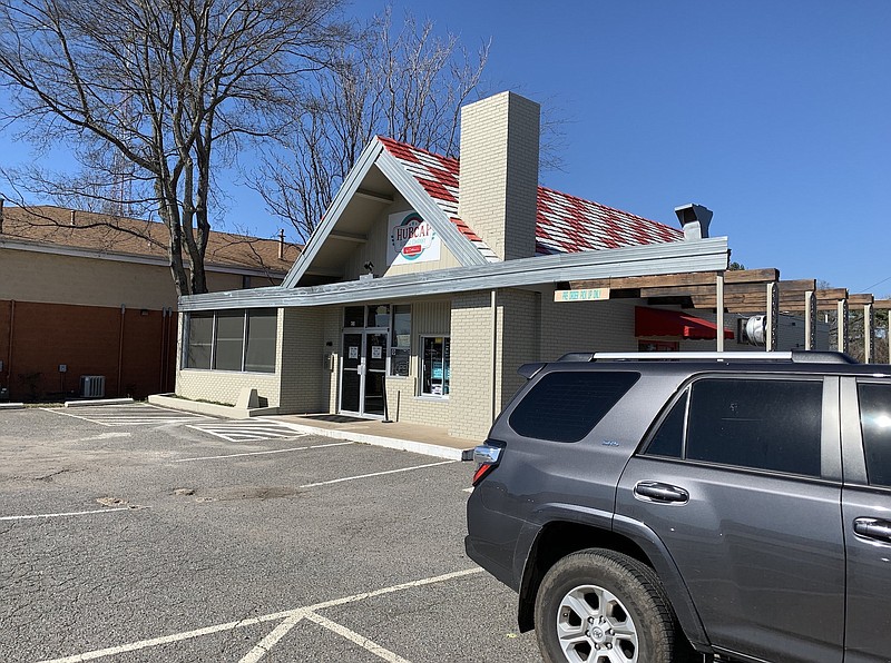 Hubcap Burger Co., closed since a pickup truck plowed through a wall March 23, isn't likely to reopen, owners say, because their insurance claim has been denied. (Democrat-Gazette file photo/Eric E. Harrison)