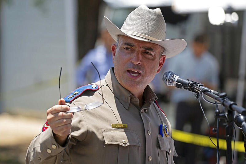 Victor Escalon, regional director of the Texas Department of Public Safety South, speaks to the press during a news conference outside of Robb Elementary School in Uvalde, Texas, on Thursday, May 26, 2022. Escalon said the 18-year-old gunman who slaughtered 21 people at the elementary school entered the building "unobstructed." (AP/Dario Lopez-Mills)