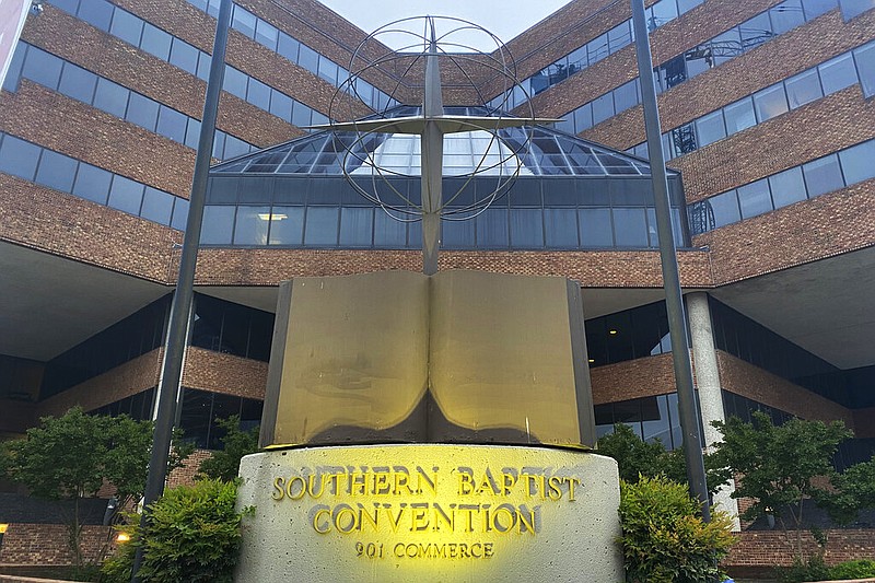 A cross and Bible sculpture stand outside the Southern Baptist Convention headquarters in Nashville, Tenn., on Tuesday, May 24, 2022. (AP/Holly Meyer)