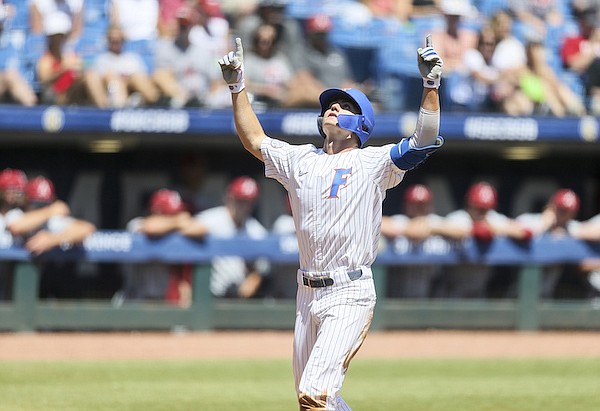 Florida's Jud Fabian celebrates a home run during an SEC Tournament game against Arkansas on Friday, May 27, 2022, in Hoover, Ala.