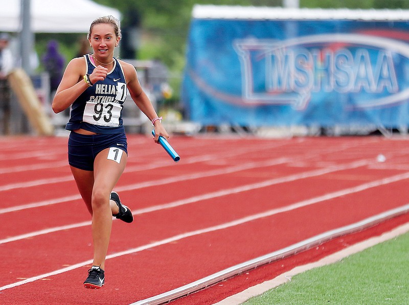 Isabelle Struemph of Helias runs a leg of the girls’ 4x200-meter relay last year in the Class 4 state championships at Adkins Stadium. (News Tribune file photo)