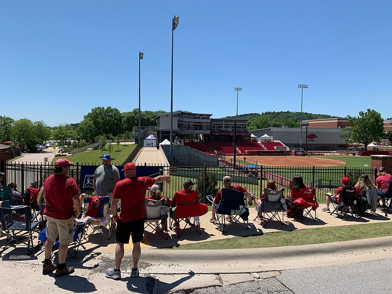 Arkansas fans line up Friday, May 27, 2022, before the start of the Razorbacks' game with Texas in the NCAA Fayetteville Super Regional at Bogle Park.