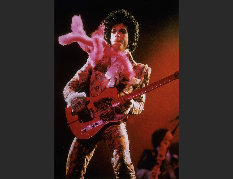 Prince performs before a sold-out audience in Houston in 1985. A reworked and re-released concert that captures Prince & The Revolution at their peak is coming in June. “Prince and The Revolution: Live” will be released Friday in a variety of formats, including digital streaming platforms, three-LP vinyl album set, a two-CD version and a Blu-ray of the concert film. (AP file/F. Carter Smith)