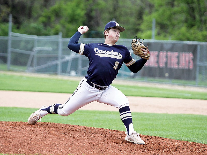 Helias pitcher Sam Wyrick delivers to the plate during a game against Jefferson City at Vivion Field. Wyrick is the probable starter for the Crusaders in today’s Class 5 quarterfinal game at Willard. (Greg Jackson/News Tribune)