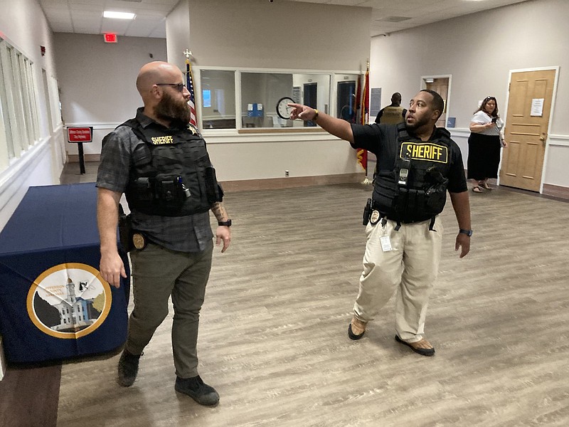 Personnel with the Jefferson County Sheriff’s office work to evacuate the courthouse during an active shooter drill last week. 
(Pine Bluff Commercial/Byron Tate)