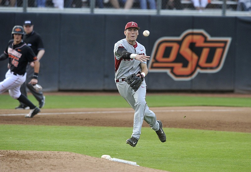 Arkansas’ Bobby Wernes makes a throw during a game at the NCAA Stillwater (Okla.) Regional in 2015. The Razorbacks begin playin this year’s Stillwater Regional against Grand Canyon on Friday. It’s the first time the Hogs have competed in a regional on the road since 2015, when they won all four of their games to advance to the super regionals.
(Democrat-Gazette file photo)