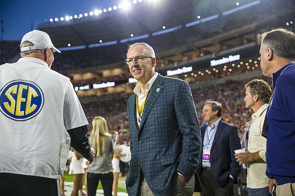 Southeastern Conference commissioner Greg Sankey watches the first half of an NCAA college football game between Tennessee and Alabama, Saturday, Oct. 23, 2021, in Tuscaloosa, Ala. (AP Photo/Vasha Hunt)