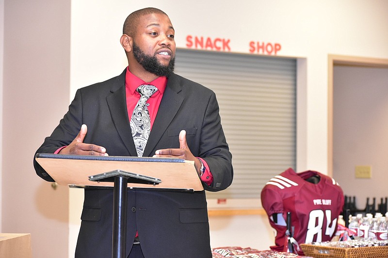 New Pine Bluff High School football Coach Micheal Williams acknowledges family members Wednesday, June 1, 2022, at the school’s student center. 
(Pine Bluff Commercial/I.C. Murrell)