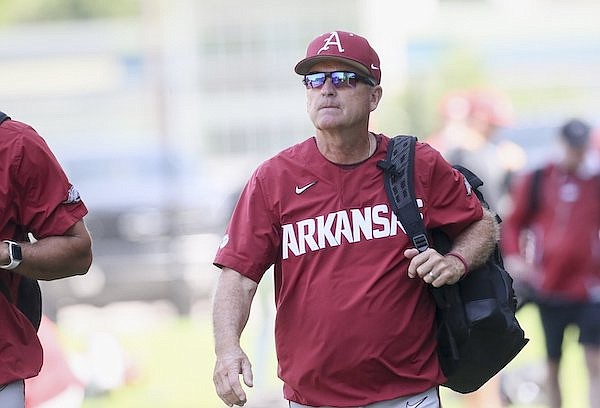 Arkansas coach Dave Van Horn walks onto the field during practice for the NCAA Tournament on Thursday, June 2, 2022, in Stillwater, Okla.