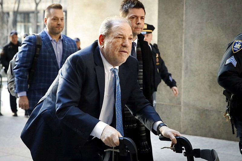 FILE - Harvey Weinstein arrives at a Manhattan courthouse as jury deliberations continue in his rape trial in New York, on Feb. 24, 2020. (AP/John Minchillo, File)