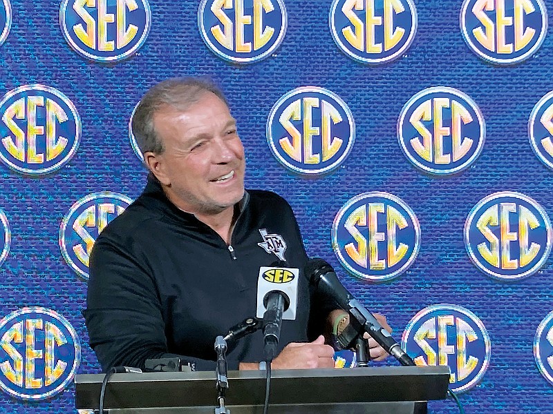 Texas A&M coach Jimbo Fisher addresses the media Wednesday in Destin, Fla. (Associated Press)