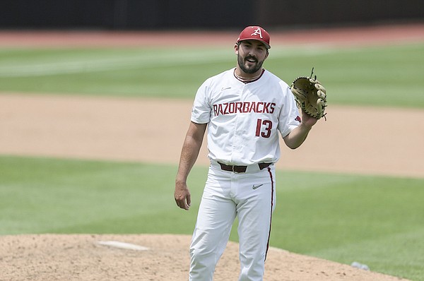 Former Razorback Kevin Kopps cheering hard for former team