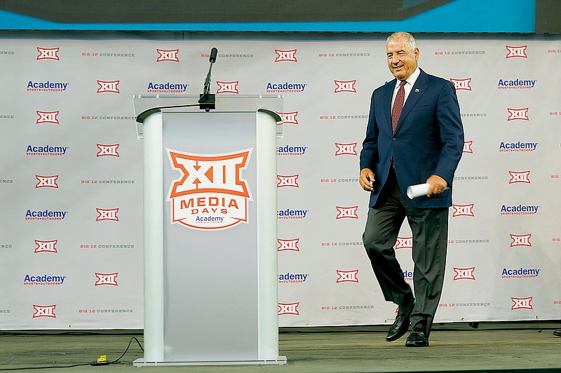 In this July 14, 2021, file photo, Big 12 commissioner Bob Bowlsby walks to the podium to speak during conference football media days in Arlington, Texas. (Associated Press)