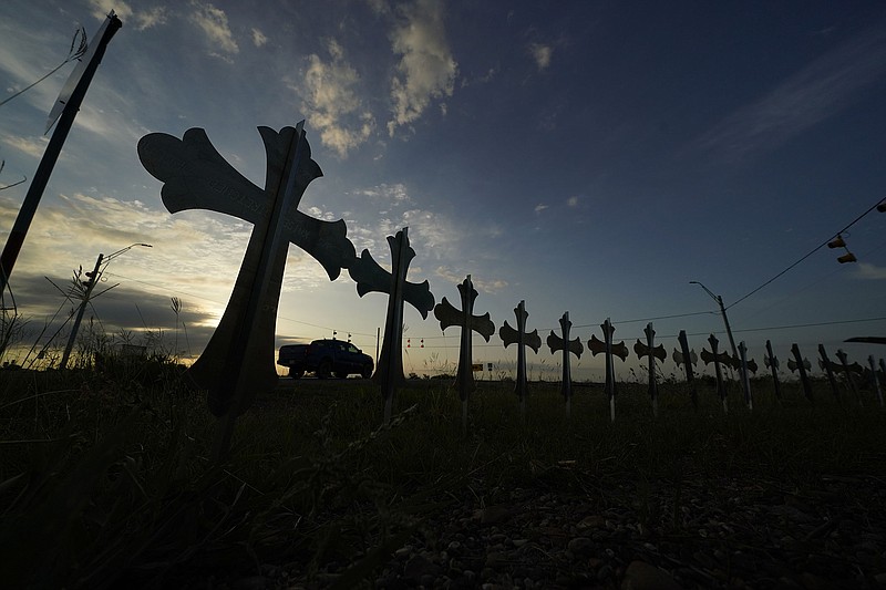 Crosses memorializing the victims of the mass shooting at Robb Elementary School are seen near a road Friday in Uvalde, Texas.
(AP/Eric Gay)