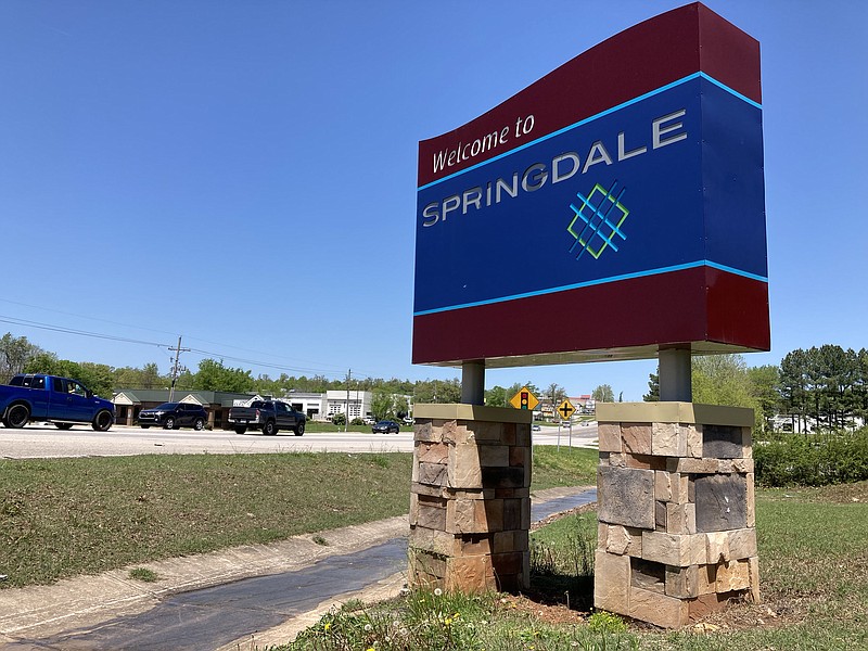 Monument sign for Springdale along Highway 71.