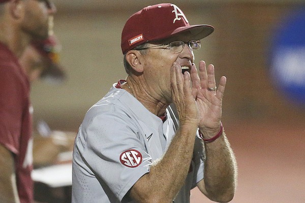Arkansas coach Dave Van Horn yells to his players during an NCAA Tournament game against Oklahoma State on Monday, June 6, 2022, in Stillwater, Okla.