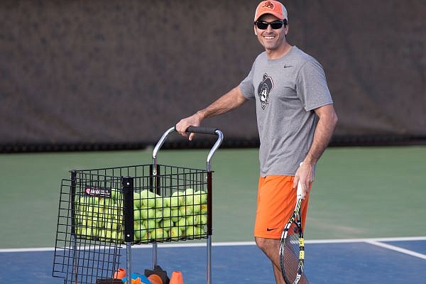 Former Razorback Udwadia named men