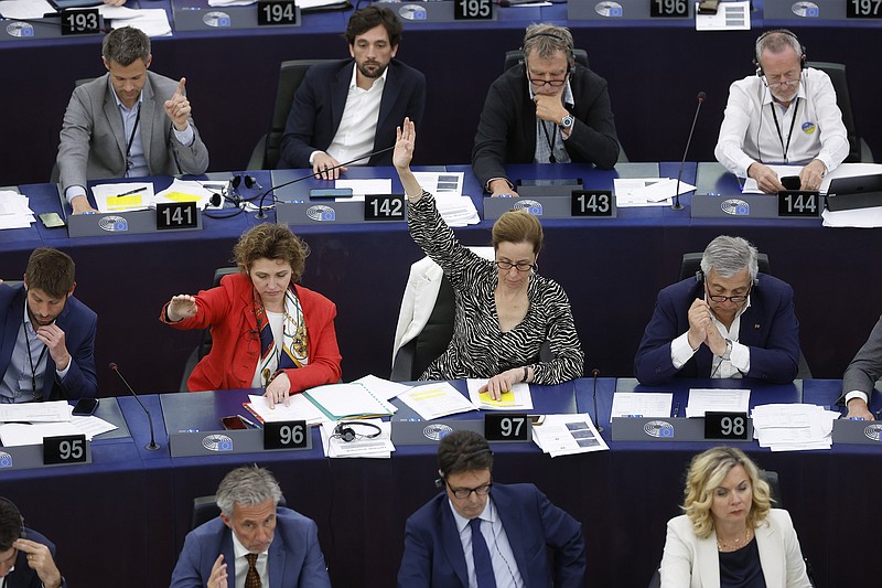 Members of the Europen Union parliament in Strasbourg, eastern France, vote Wednesday on plans to reduce carbon emissions.
(AP/Jean-Francois Badias)