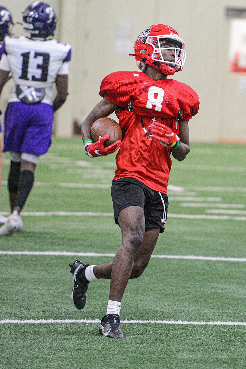 Fort Smith Northside’s Damari Smith caught four touchdown passes last season as a junior for the Grizzlies, who advanced to the second round of the Class 7A playoffs. Smith and the Grizzlies took part in a team camp at Northside on Wednesday and were joined by Greenwood, Alma, Fayetteville and Fort Smith Southside.
(NWA Democrat-Gazette/Hank Layton)