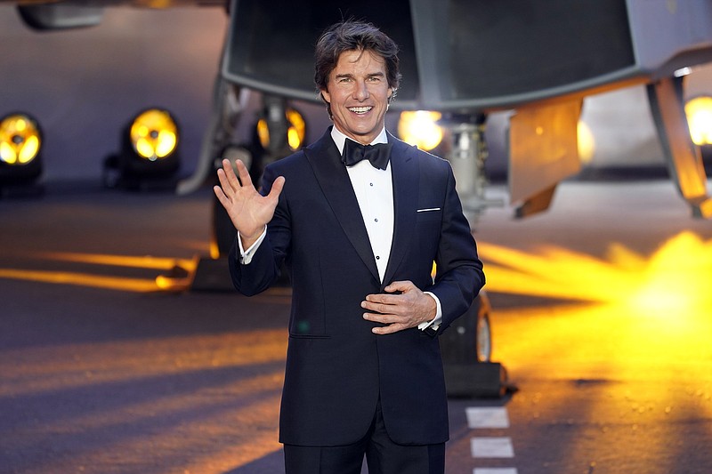 Tom Cruise poses for the media during the “Top Gun: Maverick” UK premiere at a central London cinema on May 19. The film remained at No. 1 with $86 million in ticket sales.
(AP Photo/Alberto Pezzali)