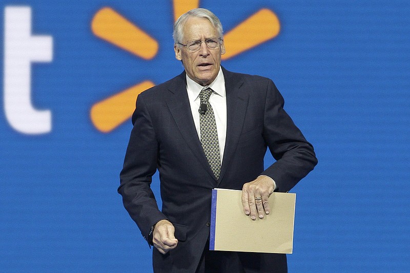 Walmart Chairman Rob Walton speaks at the company shareholders meeting in Fayetteville, Ark., June 5, 2015. The Walton family has won the bidding to purchase the Denver Broncos in the most expensive deal for a sports franchise anywhere in the world. The Broncos announced late Tuesday night, June 7, 2022, that they had entered into a sale agreement with the Walton-Penner ownership group led by Walmart heir Rob Walton, his daughter, Carrie Walton Penner, and her husband, Greg Penner. (AP Photo/Danny Johnston, File)